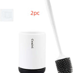 Silicone toilet brush and holder set for deep bathroom cleaning with flexible non-scratch bristles and modern hygienic design.